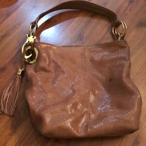 JPK Paris Leather handbag with gold Hardware and tassel.